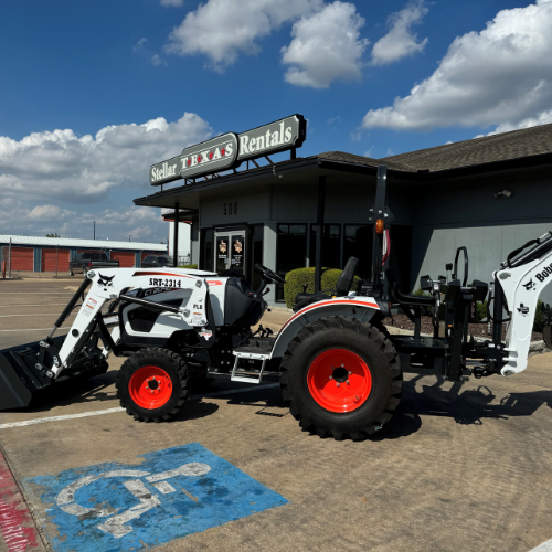 A Bobcat tractor in the Stellar Rentals Texas parking lot.