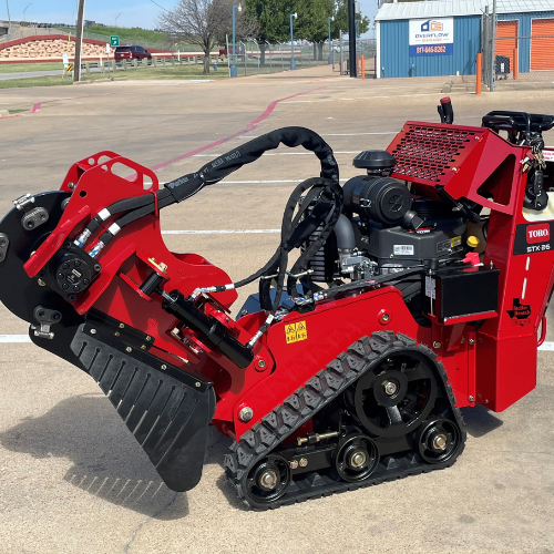 A red trencher in the Stellar Rentals Texas parking lot.