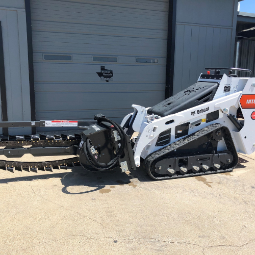 A Bobcat trencher in the Stellar Rentals Texas parking lot.